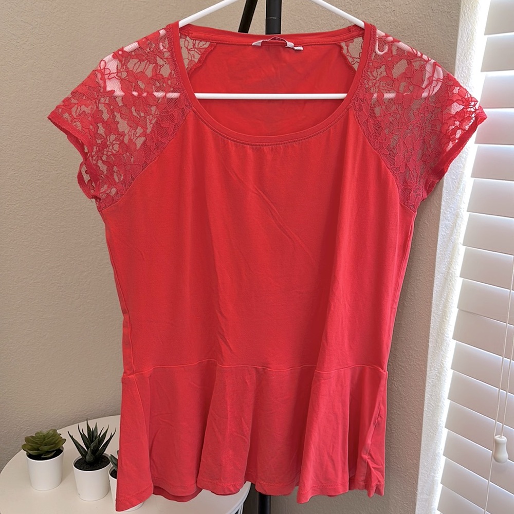 Pink peplum top